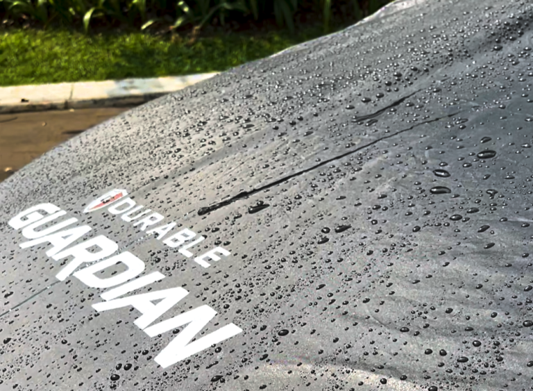 Durable Guardian Car Cover with Water Droplets