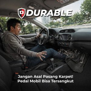 A picture of a man panicking because a car pedal is stuck on a car mat